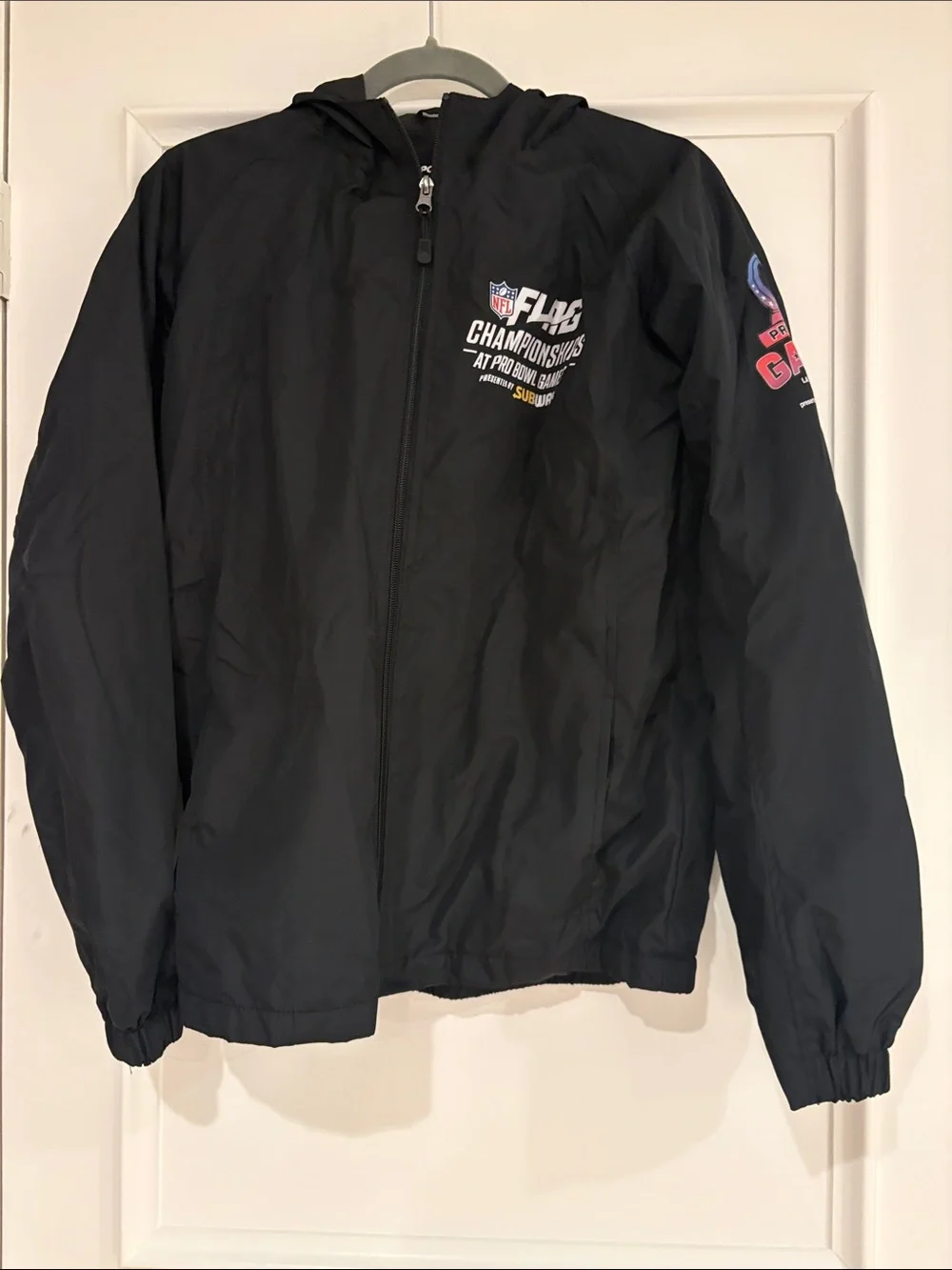 Sport-Tek Black Hooded Kids Rain Jacket with NFL Flag Championship Graphics